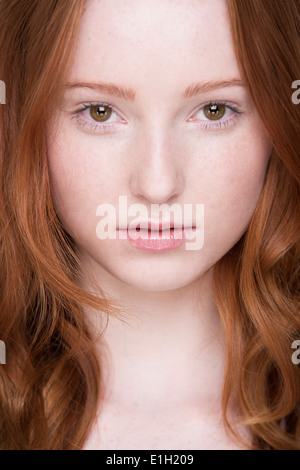 Close up portrait of young woman, looking at camera Stock Photo