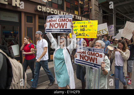 New Yorkers march in world wide day of protest against the Monsanto Corp. and its attempt to force GMO foods on people. Stock Photo
