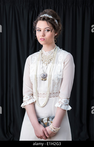 Neo-Victorian model in white dress Stock Photo