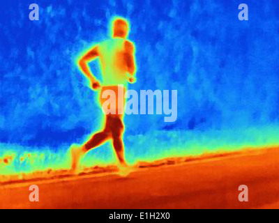 Rear view thermal photograph of young male athlete running. The image shows the heat of the muscles Stock Photo