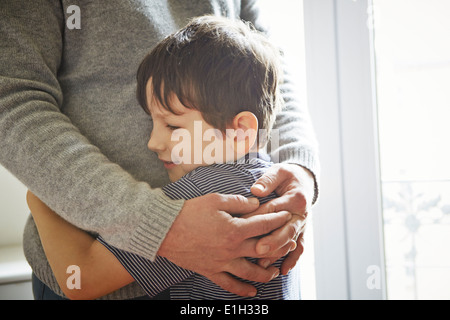 Father and son hugging Stock Photo