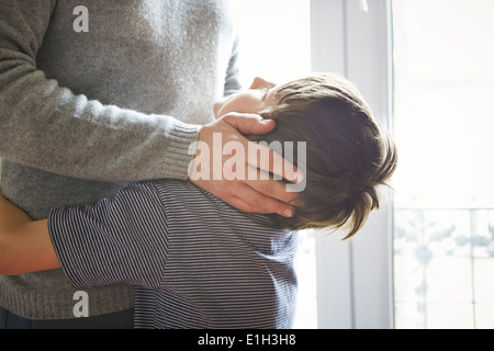 Father and son hugging Stock Photo