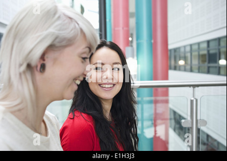 Two young women laughing, portrait Stock Photo