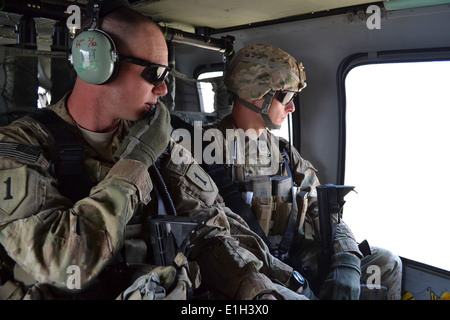 U.S. Arm Capt. Tim Black, an intelligence officer, and Staff Sgt. Christopher Lenington, an infantryman, both of Headquarters a Stock Photo