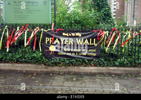 Prayer wall with prayer ribbons outside London church Stock Photo