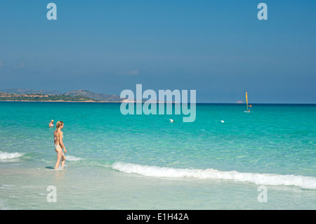 People and tourist enjoy clear water sea at La Cinta beach, San Teodoro, Olbia Tempio province, Sardinia, Italy Stock Photo