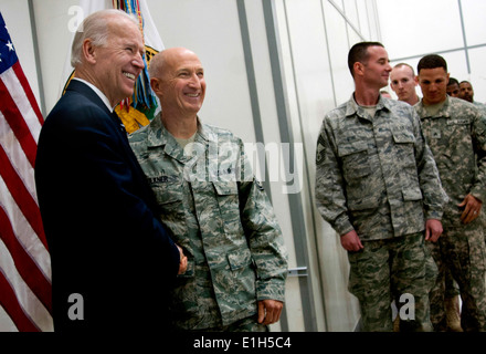 U.S. Vice President Joe Biden takes a picture with Air Force Senior Master Sgt. Paul Faulkner, a 447th Air Expeditionary Group Stock Photo