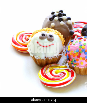 holiday desserts, different decorated cupcakes on white background Stock Photo