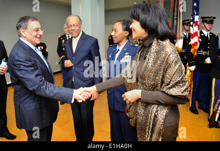 Secretary of Defense Leon Panetta greets a guest at a Martin Luther King Jr. observance in the Pentagon auditorium Jan. 26, 201 Stock Photo