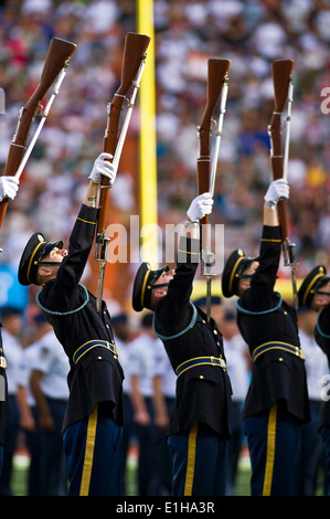 U.S. Soldiers assigned to the 3rd U.S. Infantry Silent Drill Team perform during the 2012 National Football League Pro Bowl hal Stock Photo