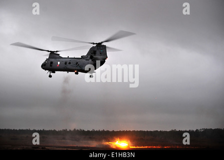 A U.S. Marine Corps CH-46 Sea Knight helicopter provides close air support at Hurlburt Field, Fla., Feb. 29, 2012, during exerc Stock Photo