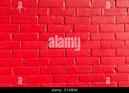 Closeup to Bright red Bricks on a wall Stock Photo