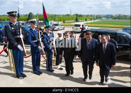 U.S. Secretary of Defense Leon E. Panetta, right, escorts Afghan Minister of National Defense Abdul Rahim Wardak, center, and M Stock Photo