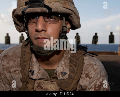 U.S. Marine Corps Cpl. Ryan Deleon, a light armored vehicle crewman with Battalion Landing Team 3rd Battalion, 1st Marine Regim Stock Photo
