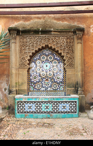 Moroccan fountain with mosaic tiles in the Andalusian Gardens of Rabat, Morocco Stock Photo