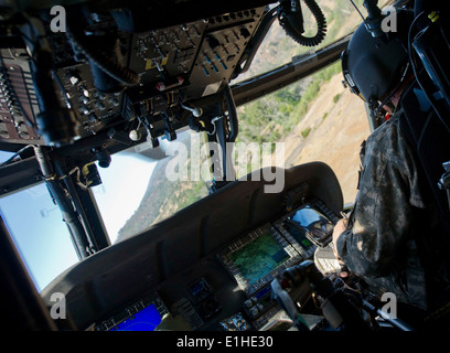 U.S. Army Chief Warrant Officer 5 Brian Wuerker, a UH-60 Black Hawk helicopter pilot with Fox Company, 7th Battalion, 158th Avi Stock Photo