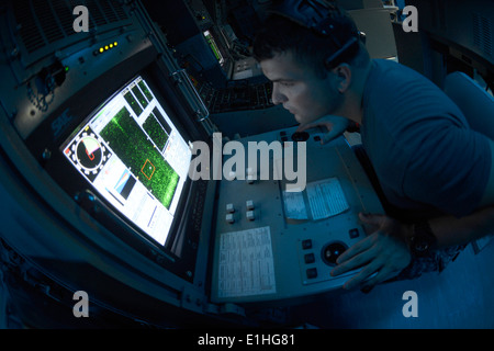 U.S. Navy Mineman 1st Class Brian Spinks, with Mobile Mine Assembly ...