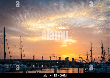 A spectacular Florida sunrise over the Bridge of Lions and Intracoastal Waterway in Saint Augustine. USA. Stock Photo