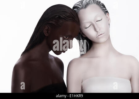 Multiracial Multicultural Concept. Ethnicity. Women Colored Brown and White. Devotion Stock Photo