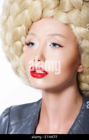 Extravagant Hairstyle. Stylish Woman with Creative Art Trendy Wig Stock Photo