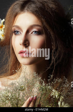 Autumn. Pensive Romantic Brunette with Leafy Withered Herbarium Stock Photo