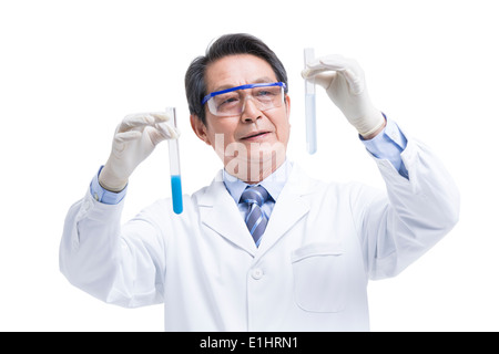 Senior scientist doing experiments Stock Photo