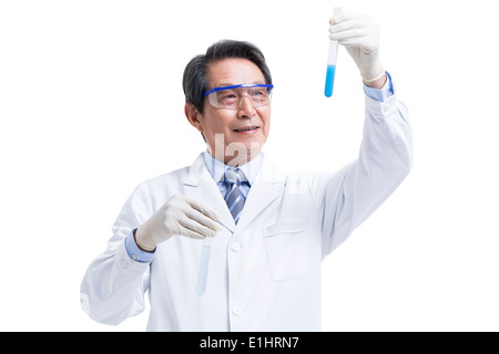 Senior scientist doing experiments Stock Photo