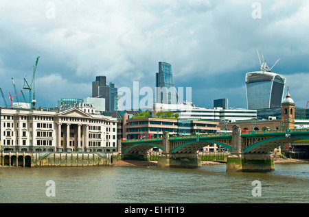 Vintners' Hall, Southwark Bridge, the Cheese Grater and the Walkie Talkie skyscrapers seen across the Thames from the Southbank Stock Photo