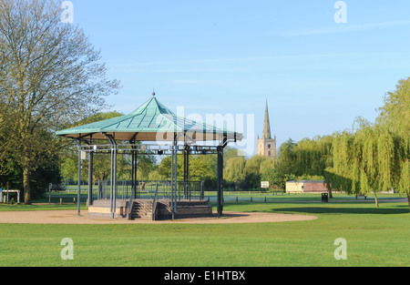Victorian Bandstand on the Recreation Ground by the Banks of the River Avon with Holy Trinity Church in the Background in Stratford upon Avon Stock Photo