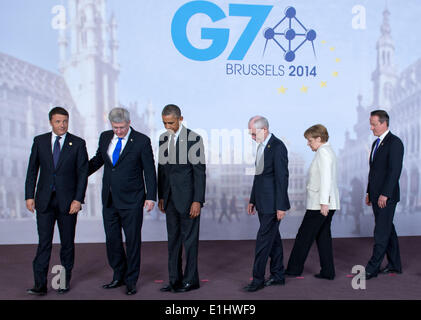 Brussels, Belgium. 05th June, 2014. Italian Prime Minister Matteo Renzi (L-R), Canadian Prime Minister Stephen Harper, American President Barack Obama, President of European Council Herman Van Rompuy, German Chancellor Angela Merkel and British Prime Minister David Cameron arrive for a family photo at the G7 summit in Brussels, Belgium, 05 June 2014. The heads of state of the seven leading world economies are meeting in Brussels. The most important topic of the talks is the Ukraine crisis. Photo: BERND VON JUTRCZENKA/dpa/Alamy Live News Stock Photo