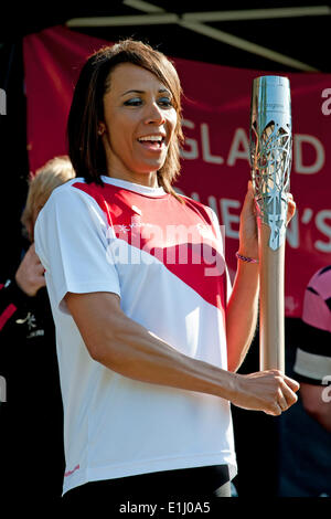 Tonbridge, Kent, UK. 5th June, 2014. . 05th June, 2014. Kent athlete and Olympic Gold medal winner Dame Kelly Holmes holds the Commonwealth Games Queen's Baton after it's arrival at Tonbridge Castle. The event was attended by children from local schools who participated in a variety of activities organised by Tonbridge and Malling Council. Credit:  patrick nairne/Alamy Live News Stock Photo