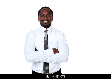 Portrait of african businessman with arms folded over white background Stock Photo