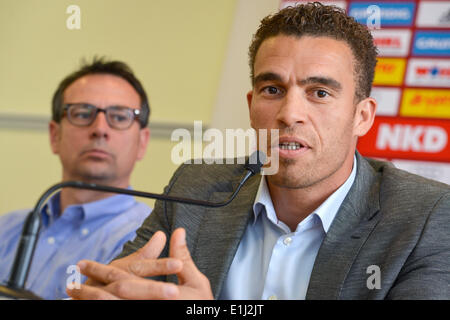 Nuremberg, Germany. 05th June, 2014. FC Nuremberg's new head coach Valerian Ismael speaks next to sports director Martin Bader during a press conference in Nuremberg, Germany, 05 June 2014. The club signed the former Bundesliga pro for the coming season in the second league. Photo: David Ebener/dpa/Alamy Live News Stock Photo