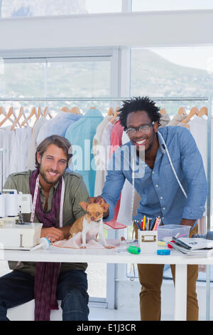 Two fashion designers with chihuahua Stock Photo
