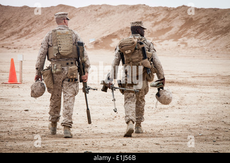U.S. Marine Corps Cpl. Darek Kelsey, left, and Lance Cpl. William Tipper, both scout snipers assigned to the 3rd Battalion, 4th Stock Photo