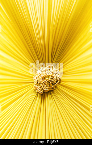 Electric lamp with rays on a yellow background, the concept of ...