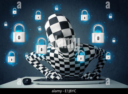 Hacker in disguise with virtual lock symbols and icons Stock Photo