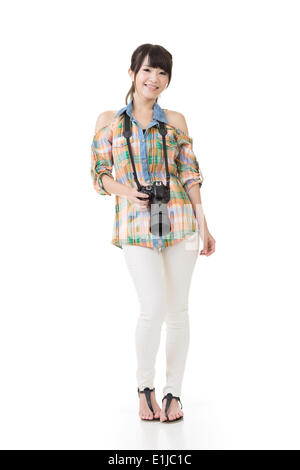 Smiling asian woman with photo camera Stock Photo
