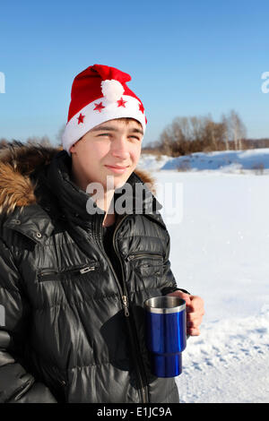 Young Man in Santa Hat Stock Photo