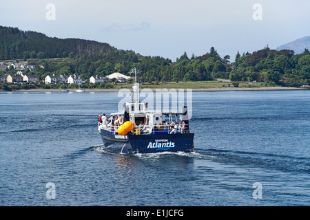 Seaprobe Atlantis glass bottom boat leaving Kyle of Lochalsh on a trip passing Kyleakin & heading towards the Skye Bridge Stock Photo
