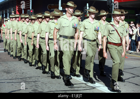 Australian soldiers with the 5th Battalion, Royal Australian Regiment march in an Anzac Day parade in Palmerston, Australia, Ap Stock Photo