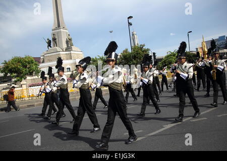 Bangkok, Thailand 4th June 2014. Marching band performing during 'Happiness' events by Thai military at Victory monument. Thai army and police forces launched the 'Returning happiness to the people' events in order to bring back smiles to the public in the aftermath of the political crisis and the military coup. Credit:  John Vincent/Alamy Live News Stock Photo