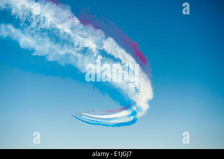 Portsmouth, Hampshire, UK. 05th June, 2014. RAF Red Arrows display over the Solent to Commemorate D-Day 70 in Portsmouth, Hampshire, United Kingdom. 5th, June 2014. Credit:  John Harper/Alamy Live News Stock Photo