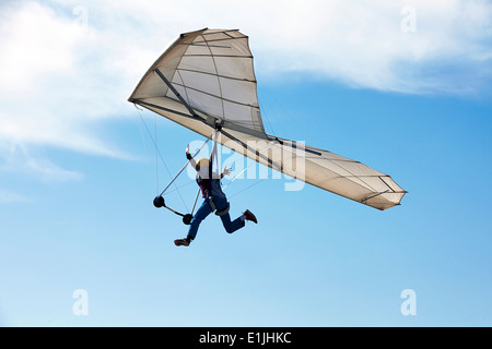 Man flying hang glider Stock Photo