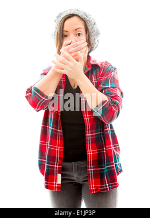Young woman with hand over her mouth and shock Stock Photo