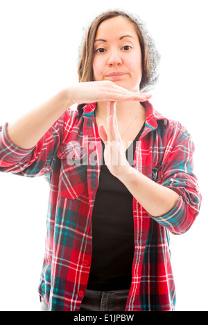 Young woman making time out signal with hands Stock Photo