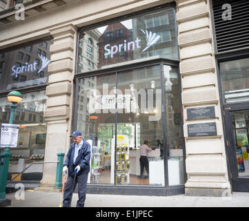 New York, NY, USA. 05th June, 2014. A Sprint store is seen in the Flatiron neighborhood of New York on Thursday, June 5, 2014. Sprint is reported to be near acquiring T-Mobile from Deutsche Telekom in a deal worth $32 billion. The two carriers, pending regulators' approval, will compete directly with the two giants, AT&T and Verizon.  Credit:  Richard Levine/Alamy Live News Stock Photo