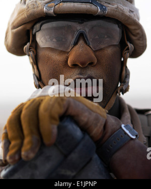 U.S. Marine Corps Cpl. Steeven Lerebours, with Fox Company, 2nd Battalion, 2nd Marine Regiment, provides security at a shura he Stock Photo