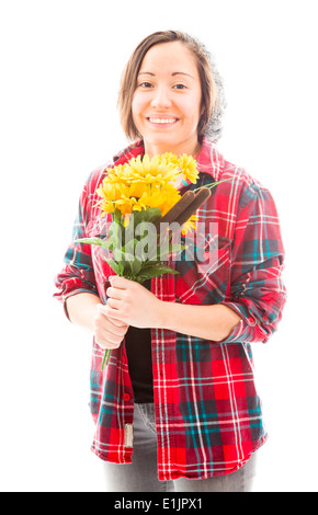 Young woman, 25, holding a sunflower in front of her face Stock Photo ...