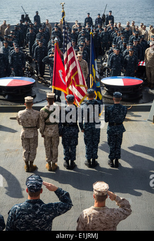 U.S. Marines assigned to the 26th Marine Expeditionary Unit (MEU), and U.S. Sailors assigned to the USS San Antonio (LPD 17), s Stock Photo